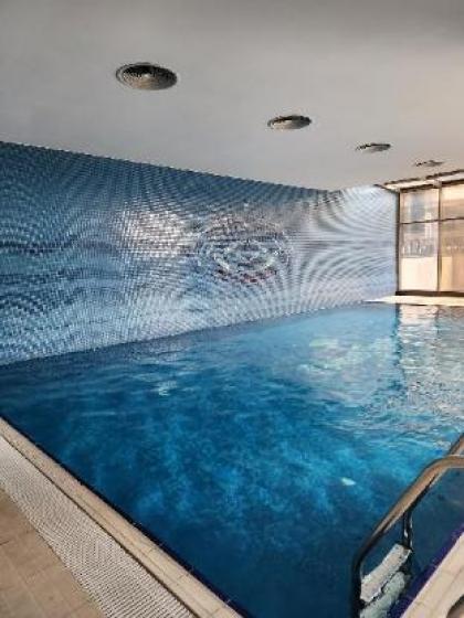 Elysium Residence Taksim 1+1 Suit pool sauna gym - image 15