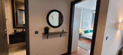 Sleek City Apartment With Premium Amenities - image 17