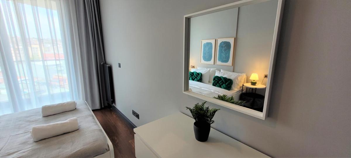 Sleek City Apartment With Premium Amenities - image 6