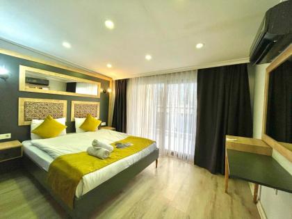 HOTEL THE NEOM SUITES - image 2