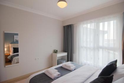 Bright & Cozy 1bdr Near Biz Cevahir Hali Mall - image 11